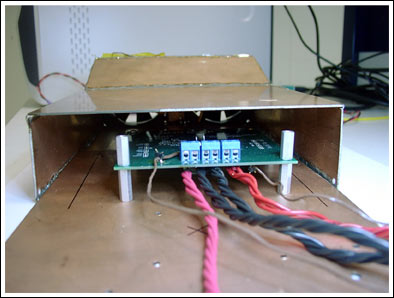 Figure 1. The thermal derating box surrounds the EV board and keeps the airflow predictable to ensure reproducible measurements.